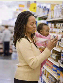Mother and baby shopping for groceries